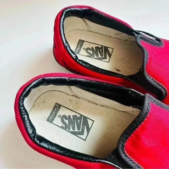 Vans Customized Slip Ons With Smokinhot Vapors Written On The Back Of The Shoes